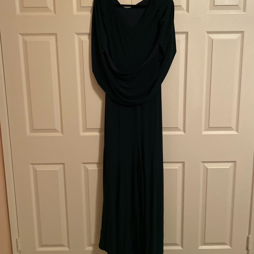 Dark green with cape like sleeves
